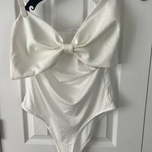 Elegant White Bow Bodysuit